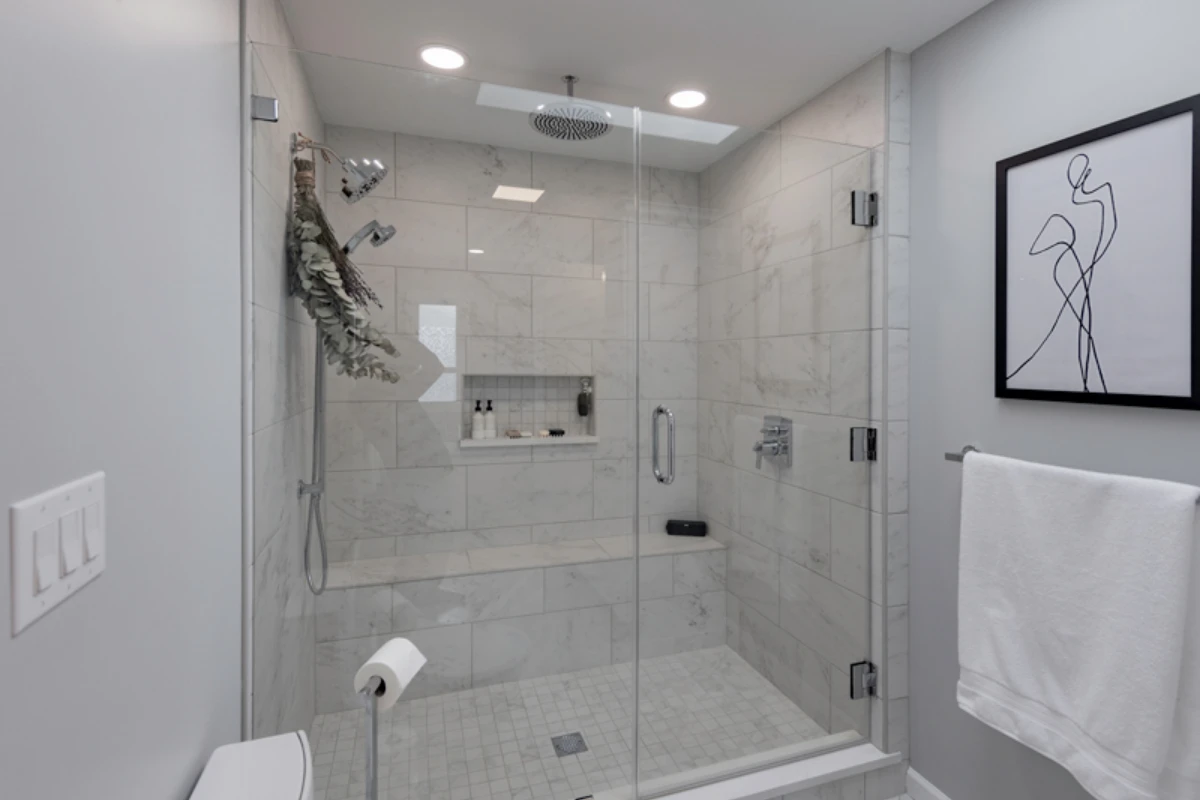 Large-format tile shower with frameless glass in Clarks Summit, PA