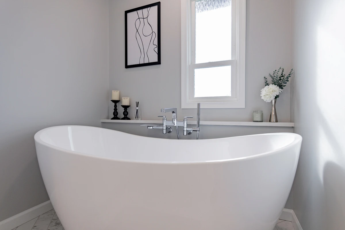 Chrome tub filler and spa fixtures in a Clarks Summit, PA remodel