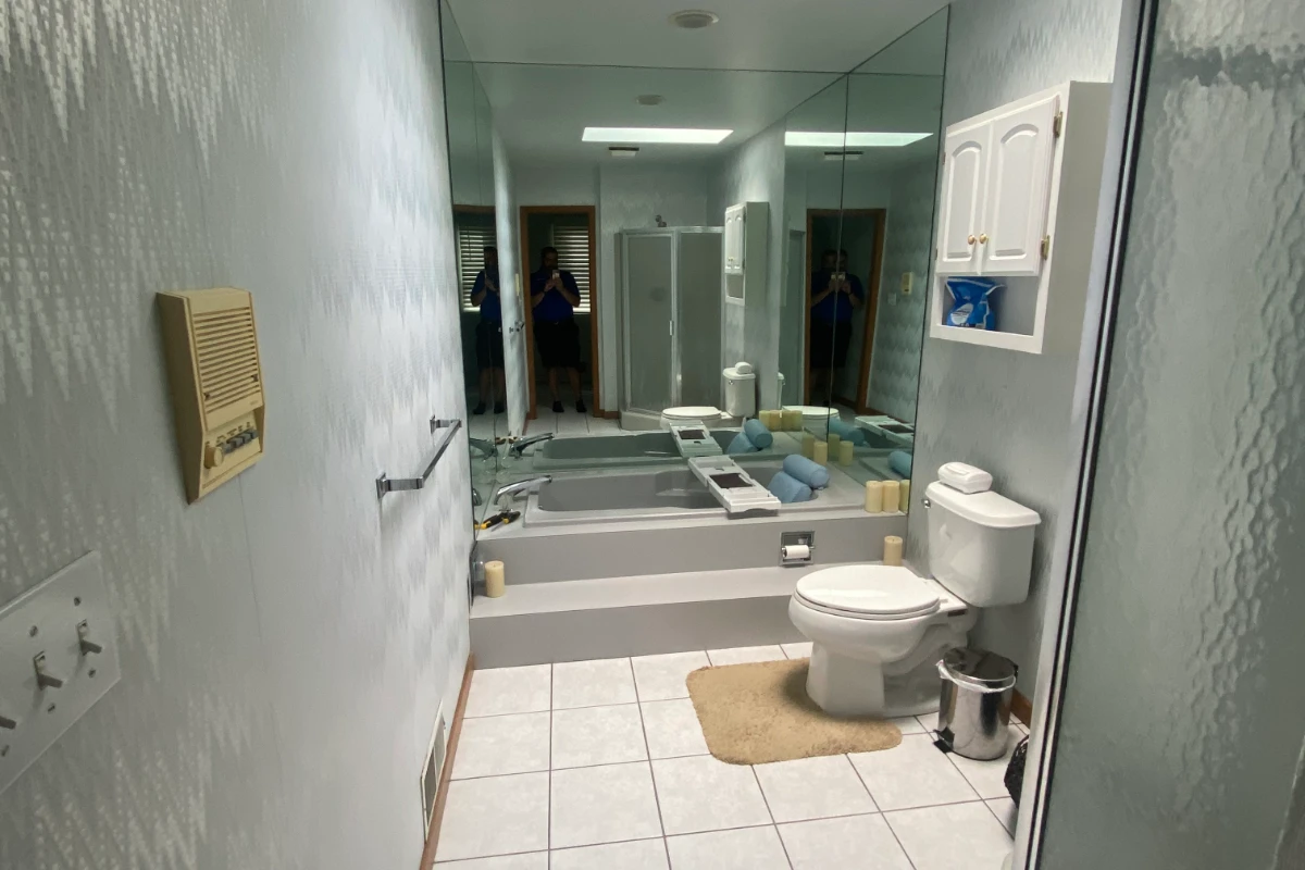 Two separate outdated bathrooms before combination in Clarks Summit, PA
