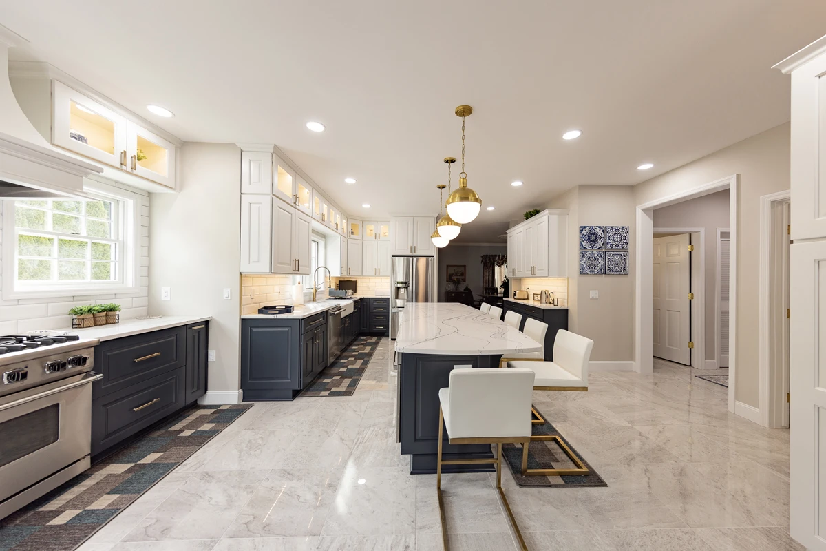 Two-tone kitchen with blue island in Dunmore, PA by Perez DBR