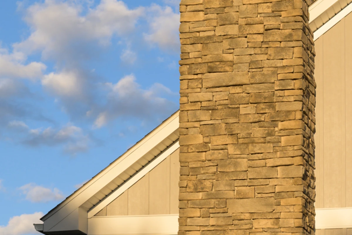 Remodeled home exterior with layered siding types in Harding, PA