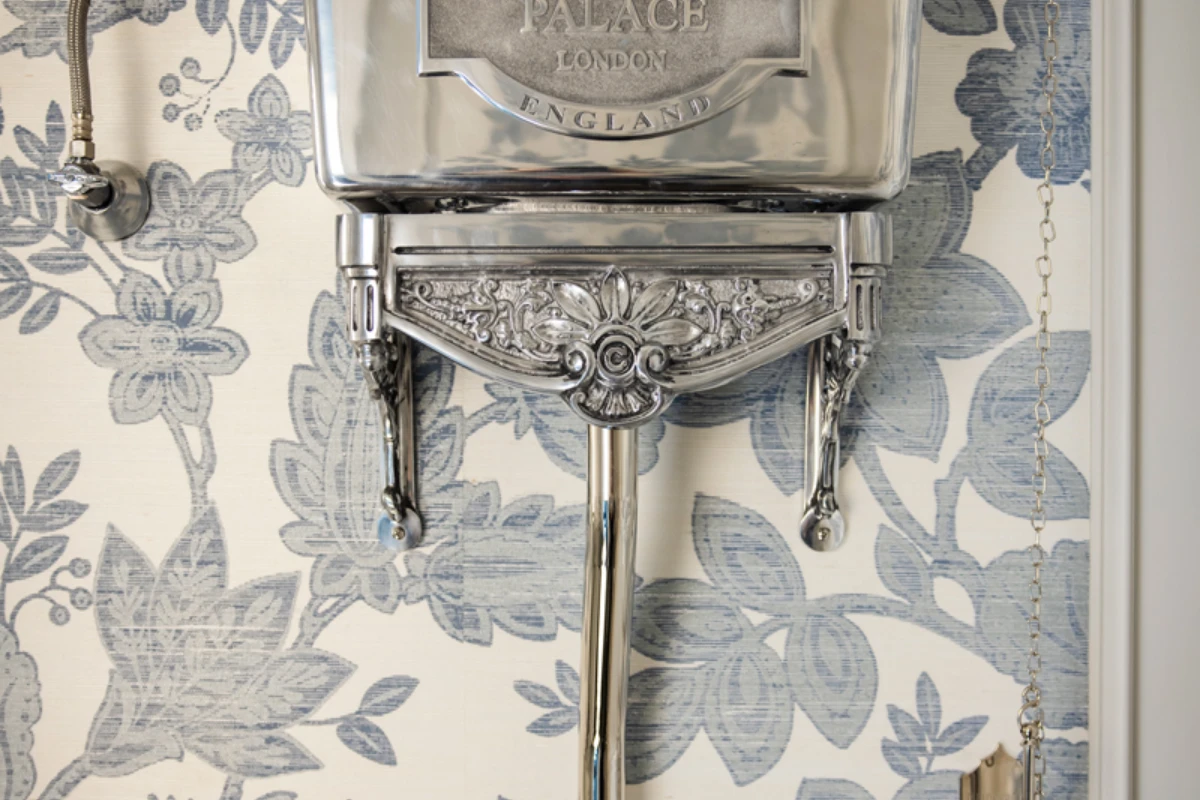 Old-world powder room details in a Newton Ransom, PA remodel by Perez DBR