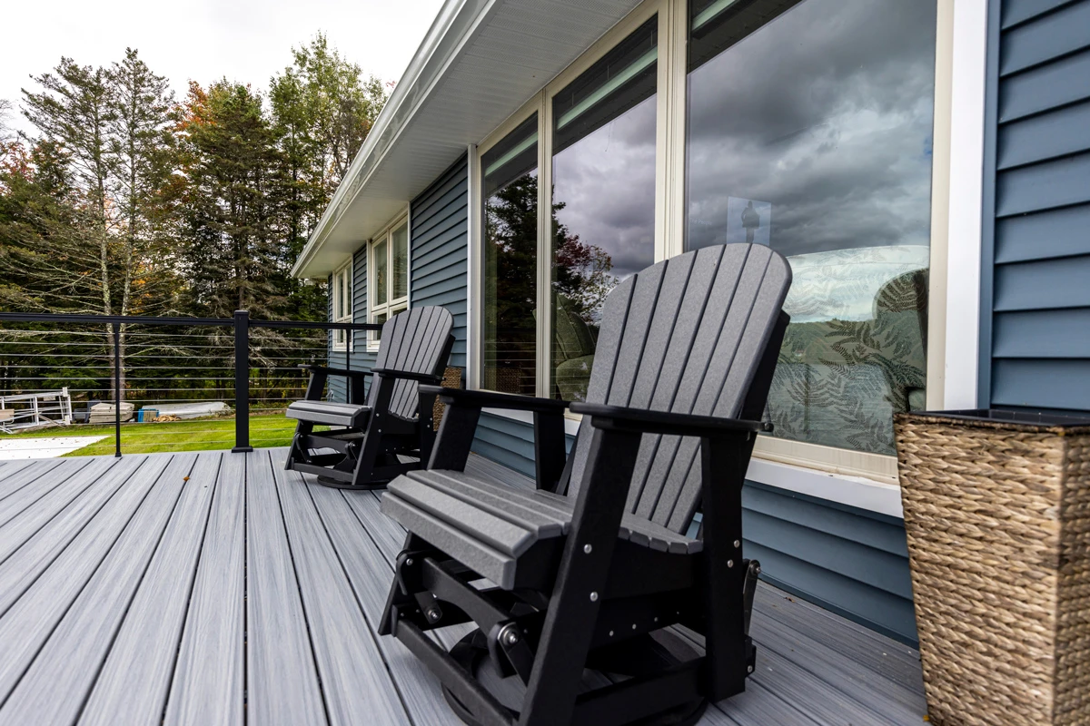 Lakeside composite deck with cable railings in Poyntelle, PA